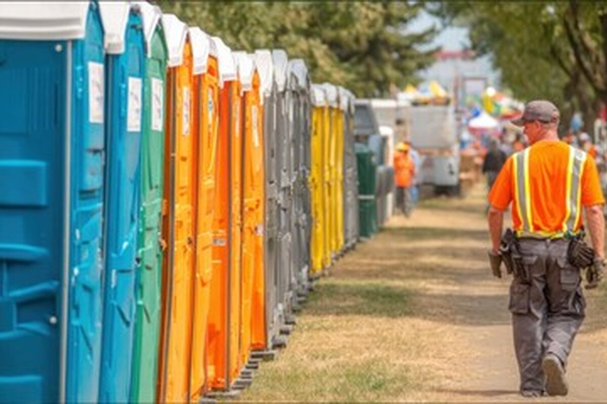 Festival portable restroom rentals in a row