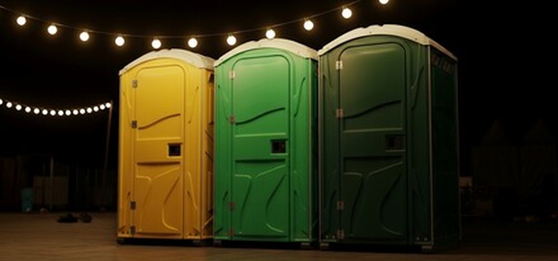 Wedding portable restroom rental with string lights