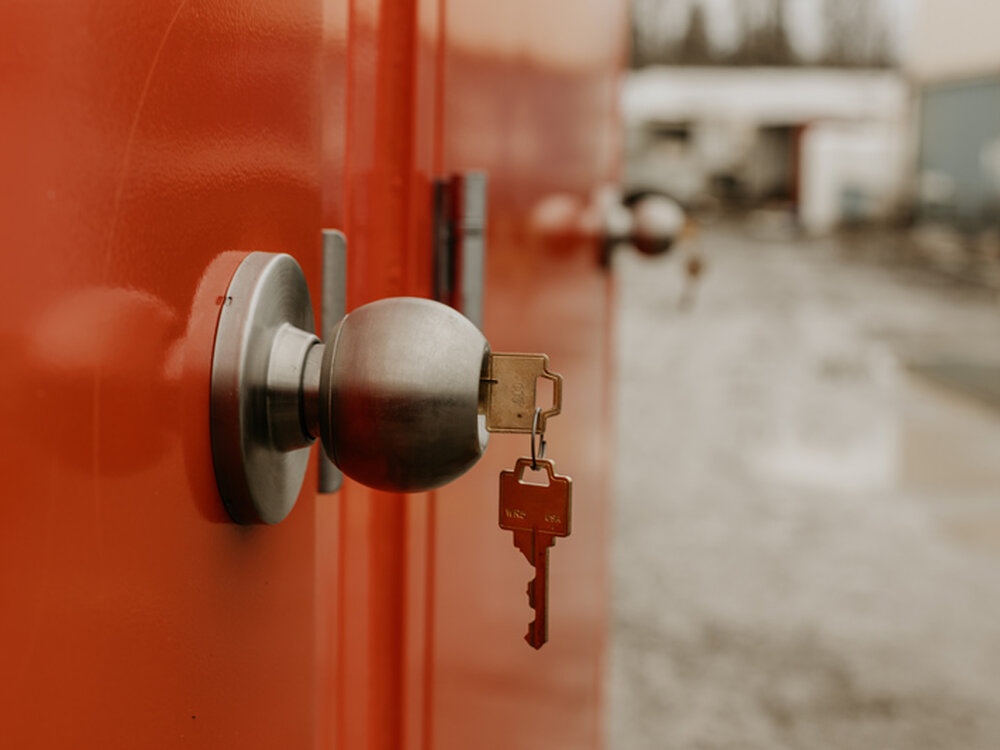 Secure lockable door on a portable restroom unit